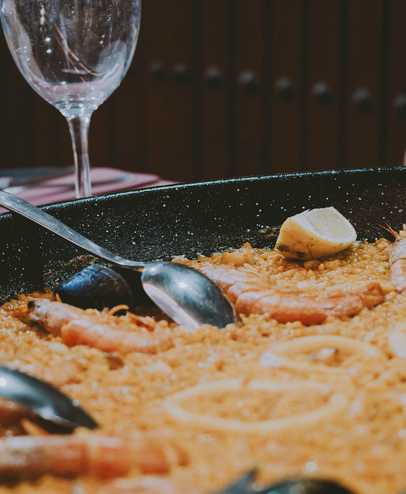 Seafood paella with prawns, mussels and lemon